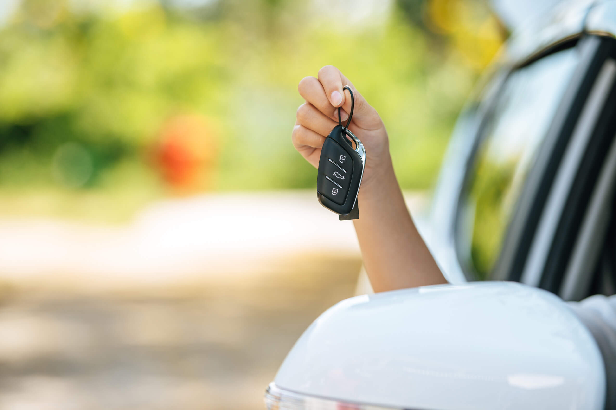 Dangling key outside car