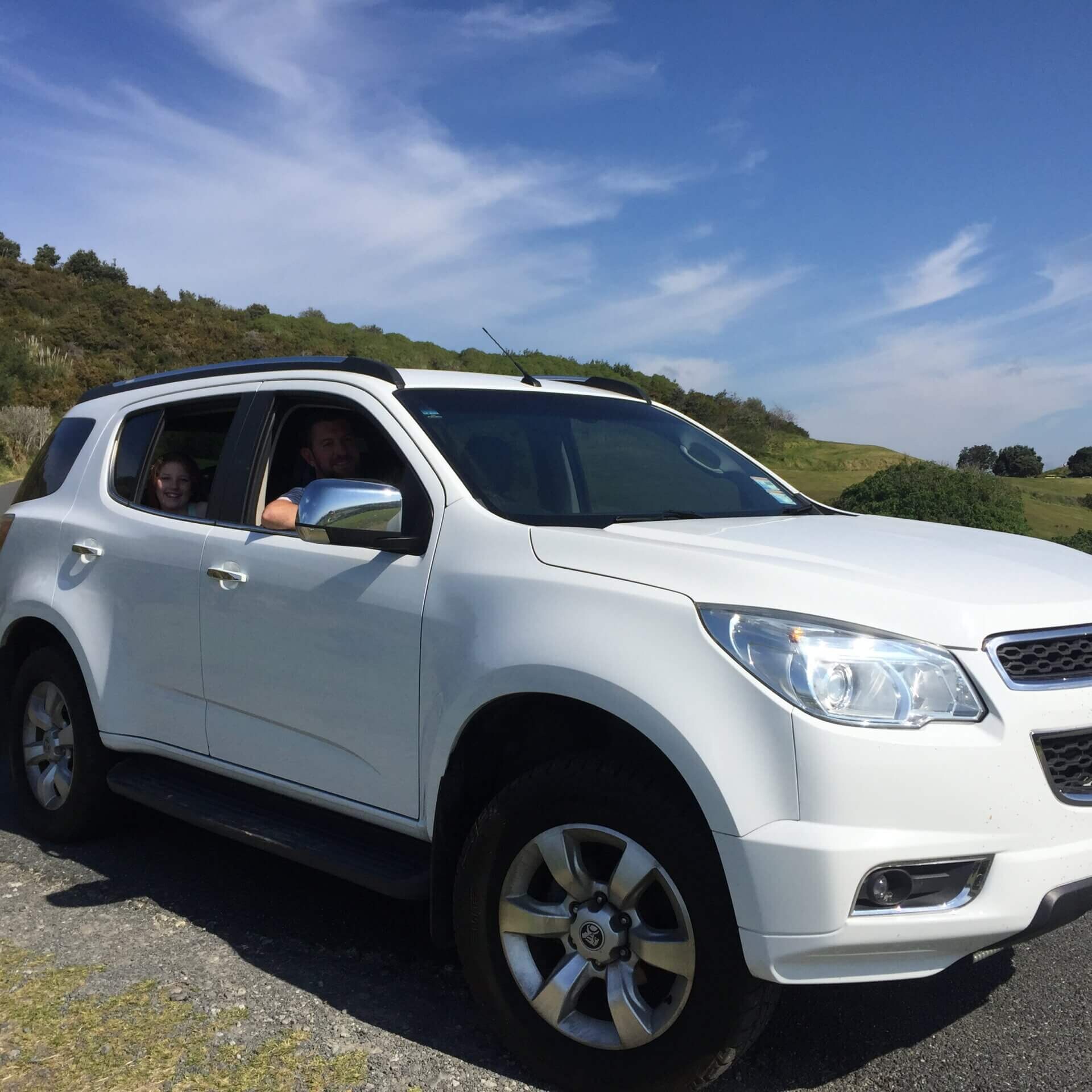 SUV in country road