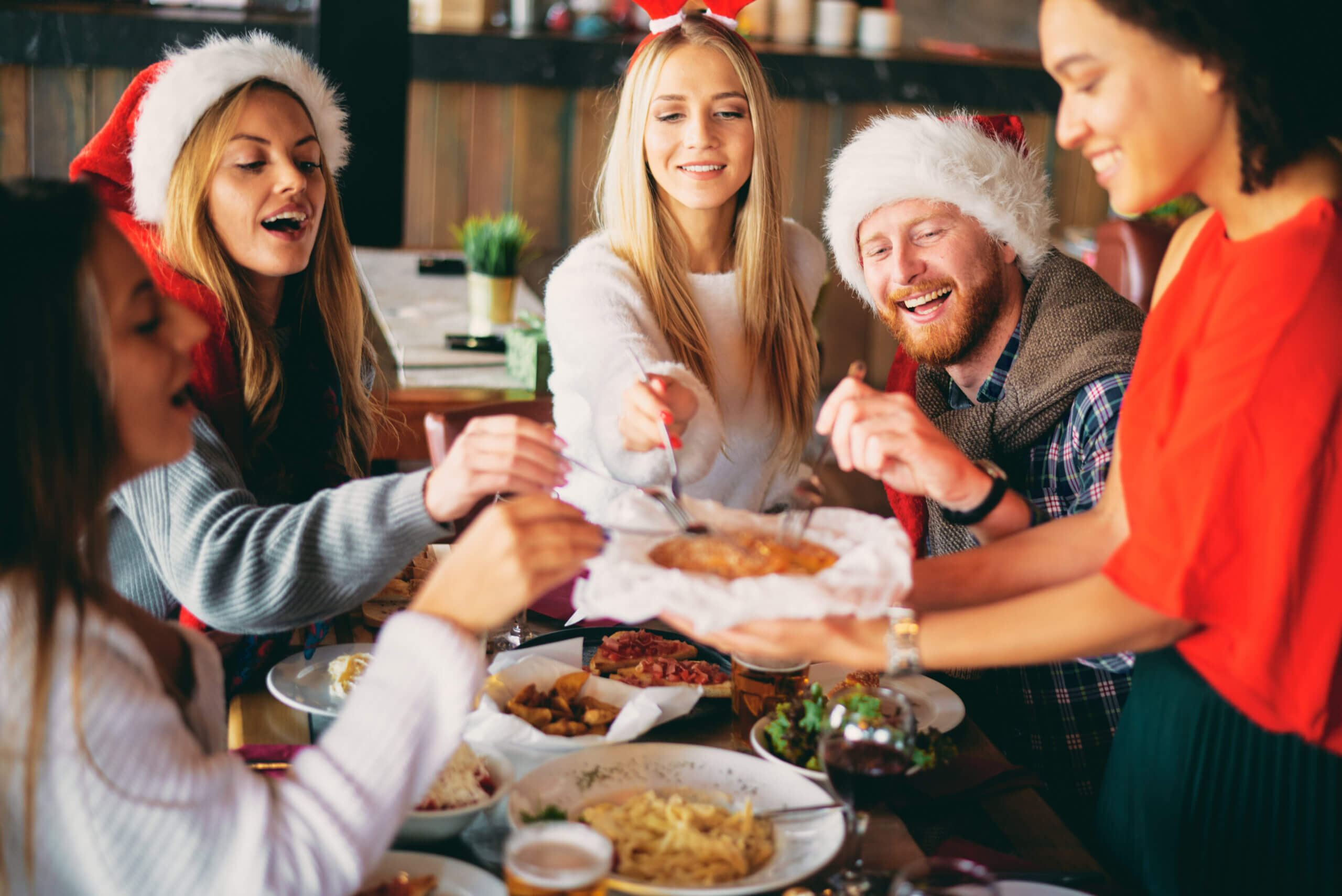 friends sharing Christmas dinner