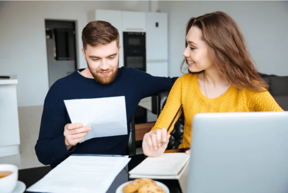 couple reviewing paperwork