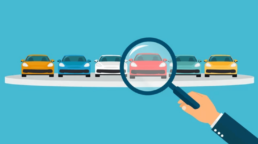 taking a closer look at a car with a magnifying glass